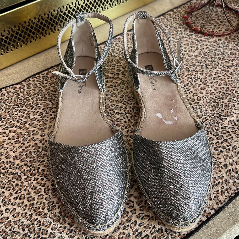 White Mountain:  Silver shine fabric.  Size 7.